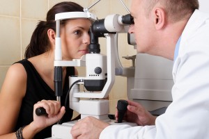 Optometrist and patient at eye appointment